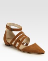On-trend suede gladiator updated by an adjustable ankle strap and a timeless point toe. Suede upperLeather liningBuffed leather solePadded insoleMade in Italy