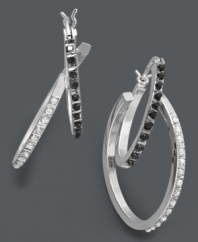 A simple twist makes a stylish impact. Doubled hoop earrings make a statement in contrasting black and white diamond accents. Set in sterling silver. Approximate drop length: 1-1/4 inches. Approximate drop width: 3/4 inch.
