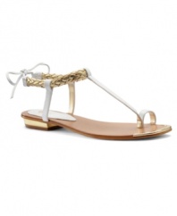The Isola Adena Flat Sandals bring together a few shining details for a great seasonal look with their braided ankle strap, toe thong and metallic heel.