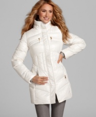 Flattering seam detailing and polished goldtone accents define this cozy-chic coat from Calvin Klein. (Clearance)