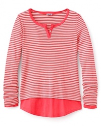 A classic striped henley gets some modern detailing for a reliable in-style look she can wear any day of the week.