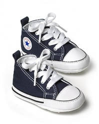 Classic high top Converse sneakers with soft soles for a comfortable fit. Great for gift giving with signature box packaging.