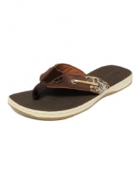 A beach bag essential. Classic boat shoe style lends a preppy vibe to the the Seafish thong sandals by Sperry Top-Sider.