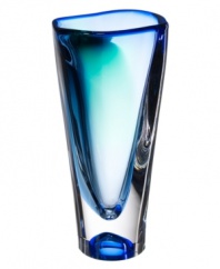 An elegant fluidity in shades of the sea gives this Vision vase from Kosta Boda an ethereal quality that's truly mesmerizing. Royal and azure blues deepen and fade in heavy art glass with a tall, asymmetrical shape and endless allure.