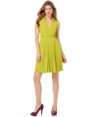 Calvin Klein plays with pleating and adds a point collar and a self-tie belt to this pretty A-line dress silhouette.