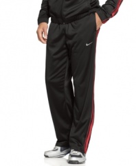 Dress the part of a pro athlete when you suit up in the ultra-smooth performance style of these Dri-Fit track pants from Nike.