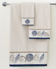Life's a beach! Charm your bathroom in a look of seaside-inspired beauty with this Hampton Shells bath towel, featuring eclectic seashells in tan and blue tones for a calming appeal. Sheared velour face; terry reverse.