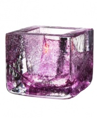 Combining the distinct features of brick and the transparency of glass, this Kosta Boda votive holder adds a fun pop of color and shine to modern spaces. Designed by Anna Ehrner.