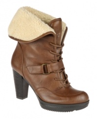 A casual, rugged look defines Naturalizer's Tyla booties. With a lace-up closure on the vamp and an adjustable velcro strap, they feature a fold-down cuff and stacked wooden heel. Pair them with aviator sunglasses as a chic complement.