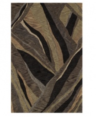 A striking abstract rendered in rich, variegated hues makes a dramatic impact in any home. Rife with lush texture and detail, this luxurious area rug from Dalyn is beautifully hand tufted in polyester and acrylic, ensuring superior color retention and long-lasting wear.