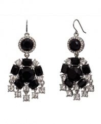 A sophisticated silhouette. A circular shape adds an intriguing design detail to these distinctive chandelier earrings from Monet. Set in silver tone mixed metal, they're embellished with glass crystal and jet resin accents. Approximate drop: 2-1/4 inches.
