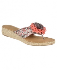 Flirty and feminine. Highlight a fresh pedicure with the floral-accented Rio thong sandals by Life Stride.