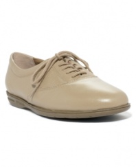 A classic Easy Spirit style, this lace-up shoe features a leather upper, cushioned insole and flexible, man-made sole. Small, gold-toned logo.