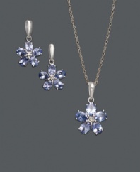 Bedeck yourself in a beautiful bouquet. Jewelry set features oval-cut tanzanite (2 ct. t.w.) and round-cut diamond accents in a floral pattern. Set in sterling silver. Approximate length: 18 inches. Approximate pendant drop: 3/4 inch. Approximate earring drop: 3/4 inch.