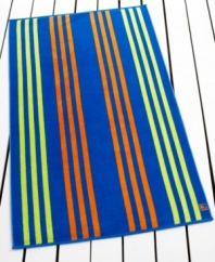 Lounge on the beach or by the pool with this Samoa Stripe beach towel from Lauren by Ralph Lauren, featuring classic stripes in a vibrant palette.
