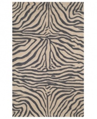 Venture outdoors with this chic area rug, displaying a classic zebra-print design. Hand-hooked of a durable polypropylene-acrylic blend, the Ravella rug can go virtually anywhere! Give some life to your outdoor patio or add some intrigue to your fashion-forward family room.