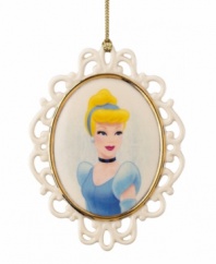The new belle of your holiday ball. A pretty cameo of Cinderella in ivory porcelain with gold trim, this Lenox ornament will live happily ever after on your tree. Qualifies for Rebate