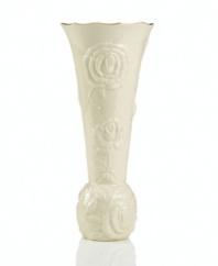 With lush roses and delicate dots carved in ivory porcelain, this classic vase offers a fine setting for small bouquets. A scalloped, gold-tipped rim adds an element of grandeur to your arrangement. Qualifies for Rebate