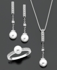 A complete jewelry set with unmeasurable elegance. Pendant, ring and earrings feature round-cut diamond (1/5 ct. t.w.) and cultured freshwater pearl set in sterling silver. Pendant measures approximately 18 inches with a 1-1/4-inch drop. Earrings measure approximately 1-1/4 inches. Ring size 7.
