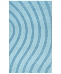 Abstract and absorbing, this cool blue rug adds movement to any room. Playful, wavy lines reverberate against a soft baby-blue ground, resounding with personality in your home.