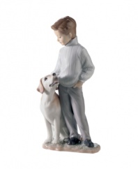 Boy's best friend. A charming gift for dog owners, this handcrafted Lladro figurine features a dapper young man and his doting Labrador.