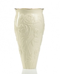 With lush roses and delicate dots carved in ivory porcelain, this classic vase offers a fine setting for fresh bouquets. A scalloped, gold-tipped rim adds an element of grandeur to every arrangement. Qualifies for Rebate