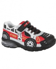 Start the engine! He'll be ready to get out the door fast in these fun fire truck-themed Stride Rite shoes that light up whenever he walks.