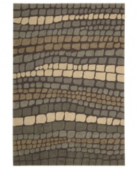 At once rustic and chic, Nourison's Fantasy rug is a stepping stone to great contemporary style at home. Hand-hooked of high-density fibers, the rug features a cobblestone-inspired pattern in tonal slate greys, lending an earthy, elemental feel to any space.