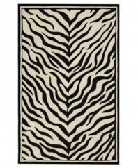 Nature-inspired designs lend beauty to the Utopia collection from Sphinx. Hand-tufted of fine wool, this lustrous rug's black and white zebra pattern is a gorgeous way to add sophisticated character to your home. With an ultrasoft hand for a blissful result.