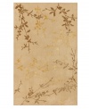 Delicate branches stretch across the smooth tan ground of this chic and sophisticated area rug from Surya. Made with a mix of wool and art silk, this hand-tufted rug has a luxurious luster that lifts the profile of any room.