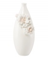 Sculpted camellia blossoms pop with peachy accents against this glossy white Flora vase. A quiet beauty in graceful Lenox porcelain. Qualifies for Rebate