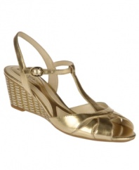 Perfectly lovely, the Holt wedge sandals by Naturalizer soften any look with their slim design and delicate ankle strap.