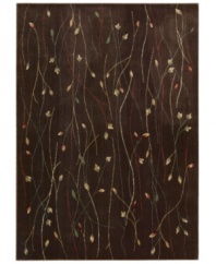 With a flowing floral motif, this area rug offers an organic appeal to your decor. Vines intertwine over a rich chocolate background, each branch hand-carved to add that extra dimension and eye-pleasing interest.