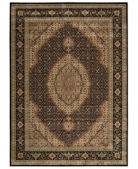 Distinctive flair with roots in Persian design. This exquisitely ornate area rug is abound in deep, striking black and beige tones, highlighted by a dramatic central medallion, and crafted from Nourison's own Opulon(tm) yarns for a densely woven pile with long-lasting color retention and durability.