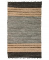 Olé! Spice up your decor with the gorgeously festive style of the Matador rug from St. Croix. Durable leather strips in elegant grey and cream hues are meticulously hand woven with fine cotton strands, resulting in a beautiful, rustic texture and natural braided pattern that accents even the most eclectic decor.