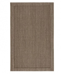Lauren by Ralph Lauren couples contemporary, effortless style with natural fibers, creating an attractive accent for the indoors. The Huxley area rug boasts marvelous texture in its central wave design and provides ultimate softness with an ingenious construction of sisal and jute.