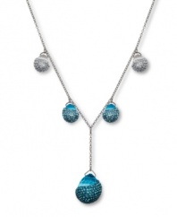 Dazzling and dramatic. Aquarmarine-hued crystals combine with clear crystal Pointiage® accents to enhance the beauty of Swarovski's Play Indicolite Y pendant necklace. Set in silver tone mixed metal. Approximate length: 15-7/10 inches. Approximate drop: 1-1/2 inches.