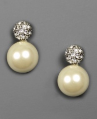 Bask in beauty. These elegant Givenchy earrings feature glass pearls and crystal accents set in silvertone mixed metal. Approximate drop: 1/2 inch.