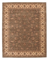 Expand beyond the standard borders of the room-size rectangle with the Nourison 2000 area rug collection. Classic in design, of the moment, while still boasting a chic sophistication, this rug features an intricate design of flowers in warm moss and taupe hues. Made of 100% silk and wool pile.