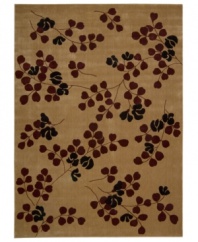Take your decorating cues from nature's most beautiful scenery. This awe-inspiring area rug comes alive with heart-shaped blossoms and bold black flowers, hand-carved to add that extra dimension and eye-pleasing interest.