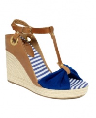 Set sail this season with the Ricky wedge sandal by Kelsi Dagger. Classic espadrille detail and a mash-up of materials create a must-have summer style.