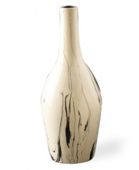 Big on style, this Howard Elliot vase boasts a sleek bottle shape and swirling black glaze in off-white ceramic. No flowers necessary.