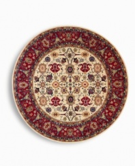 Patterned on an antique Mahal carpet design, this round rug showcases the intricate beauty of flowers, leaves, vines, vases and palmettes on a soft ivory ground. A special dyeing process imparts rich, subtle gradations to a color palette that includes ivory, caramel, terra cotta, blues and soft greens. Woven in the USA of New Zealand premium worsted wool for indulgent softness.