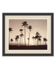 Signs of paradise. Tall palms silhouetted against a cloudless sky indicate peace and relaxation is on the horizon. An inspiring art print for the home office. Framed in timeless, beaded black with a soft, neutral mat.