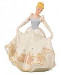 With her long gloves, flowing gown and baby-blue headband, Cinderella waltzes into your home with enchanting beauty. The Disney figurine's magnificent porcelain skirt is embellished with the scene of her escape, featuring the magic pumpkin coach in dazzling 24-karat gold. Qualifies for Rebate