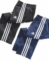 Why fuss with a button or a zip? Get him on track much faster with these striped adidas pull-on pants.