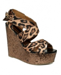 For the fashion obsessed. Show off your devotion to daring style with the sassy Worship wedge sandals by Material Girl.