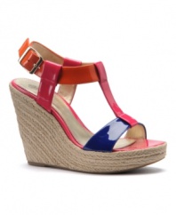 Stay vibrant this season (and on trend) with Isola's Olencia wedge sandals! The sleek patent upper boasts color blocking, matching perfectly with the elevated espadrille wedge.