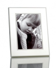 Delicately beaded edges add to the resplendent beauty of this Silver Bead picture frame from Martha Stewart Collection. Simply timeless in brilliant silver plate, it brings new attention to the past. With velvet backing.