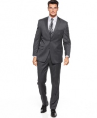 Versatile, stylish and endlessly comfortable, this solid Calvin Klein suit is the foremost choice for any modern man's tailored wardrobe.